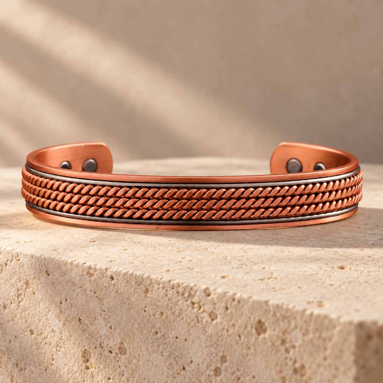 Copper-toned braided cuff shown as a product concept